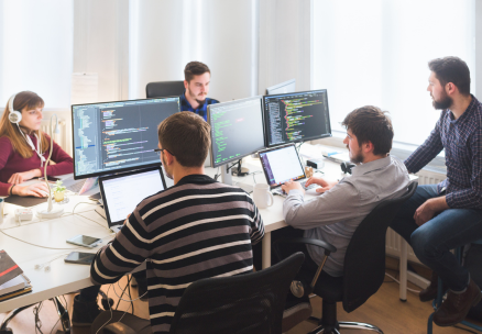 Developers at INFOTS writing clean and efficient code